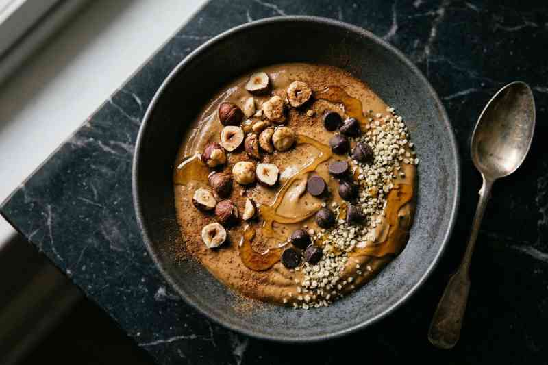 Greek yogurt high protein bowl with espresso hazelnuts and dark chocolate