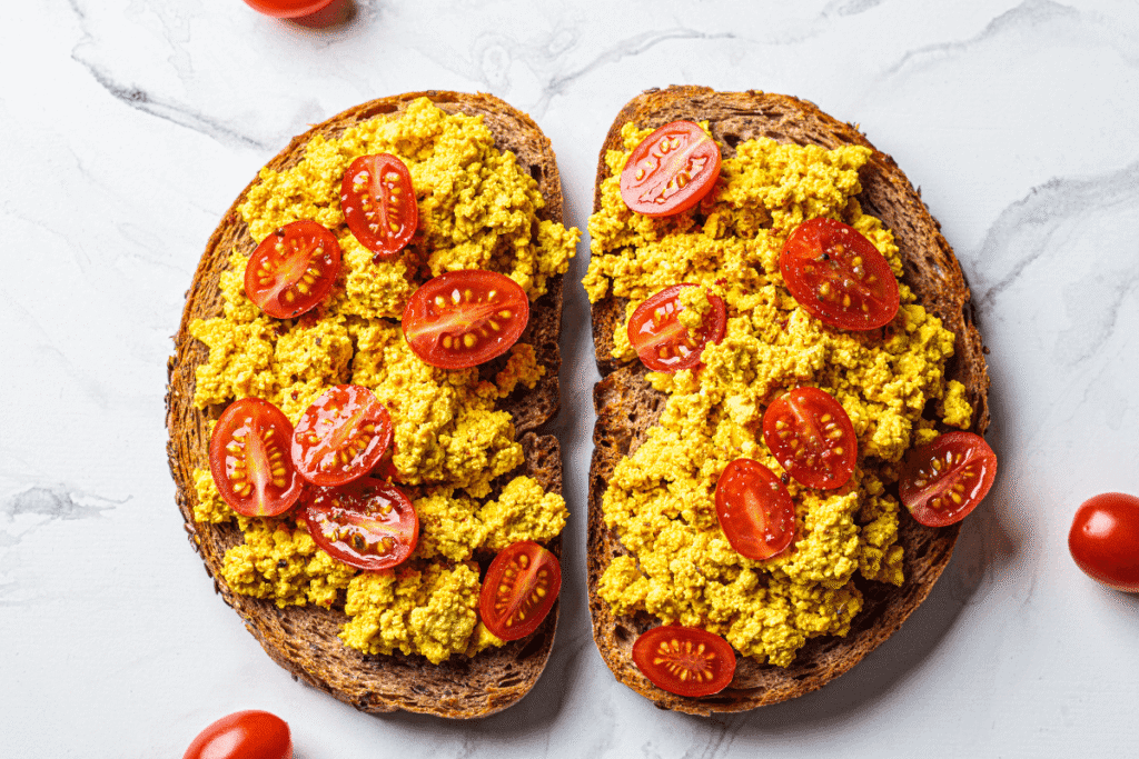 Tofu scramble with vegetables on toast – vegan high-protein breakfast