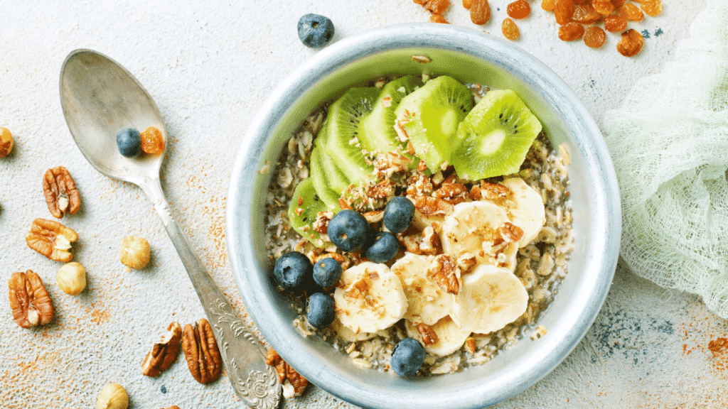 Healthy overnight oats topped with banana, kiwi, and blueberries in a bowl – easy make-ahead breakfast