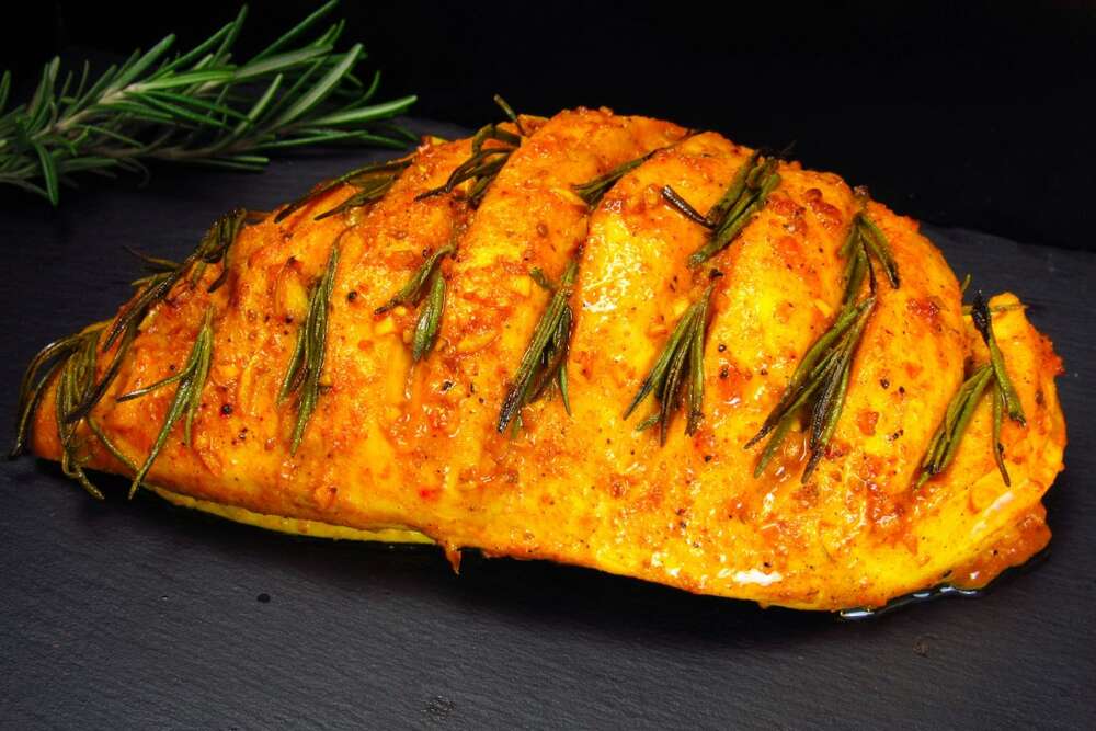 
Roasted ground turkey breast with rosemary herbs, high protein food