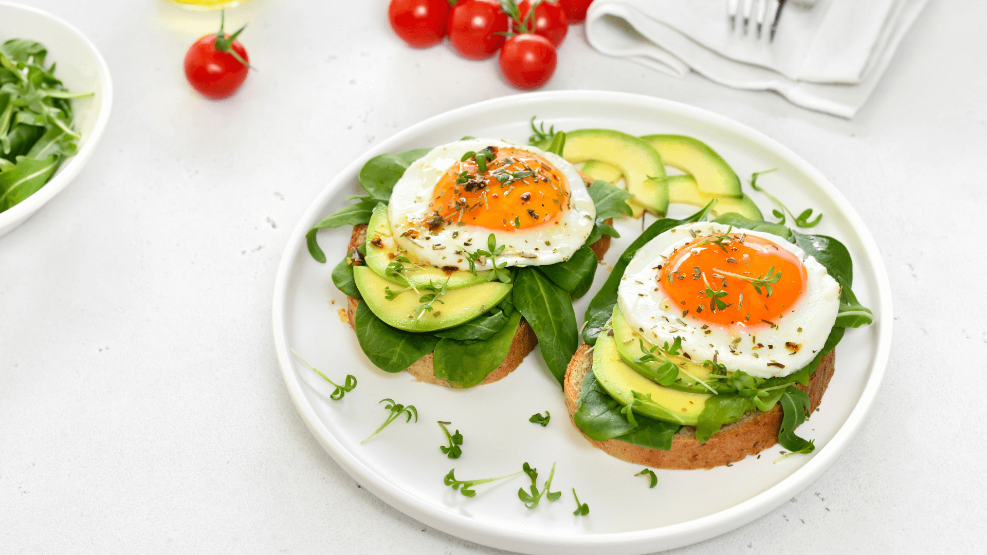 2 (9) low calorie breakfast toast with avocado, spinach, and soft boiled eggs – healthy 5 minute meal prep idea