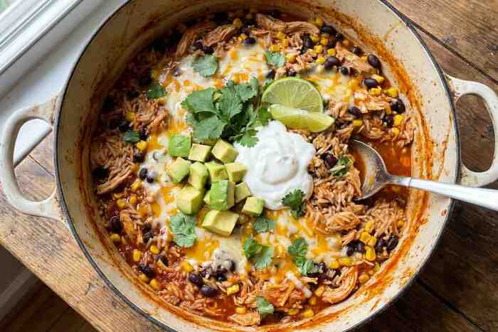 One-pot chicken burrito bowl with rice, beans and corn, complete 30 minute meal