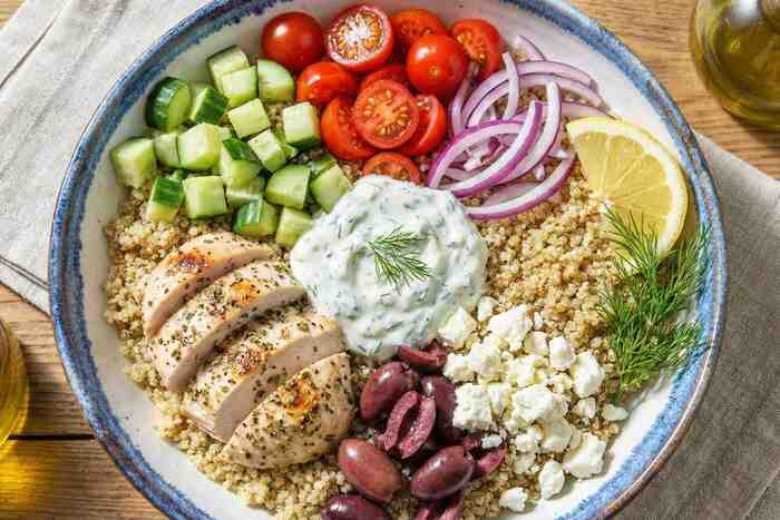 Greek chicken bowl with quinoa, feta and tzatziki, Mediterranean protein dinner