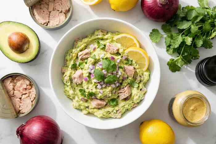 Tuna avocado salad no mayo in bowl showing creamy texture with fresh ingredients
