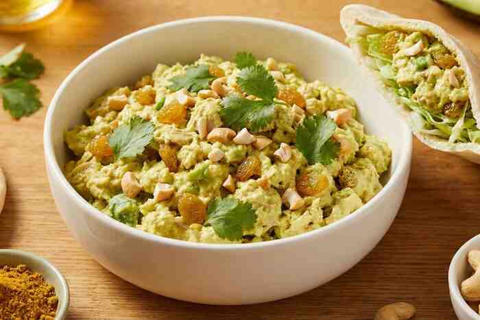 Curry tuna avocado salad with raisins and cashews, no mayo