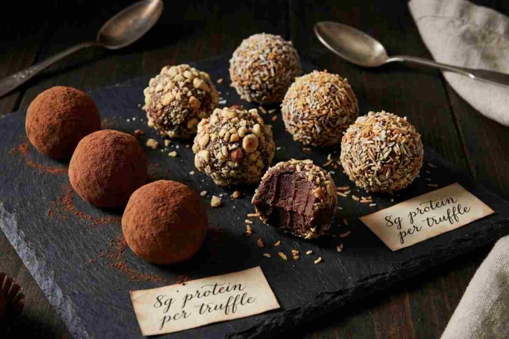 Protein chocolate truffles high protein dessert cocoa powder nuts coconut fudgy center 8g protein healthy truffles