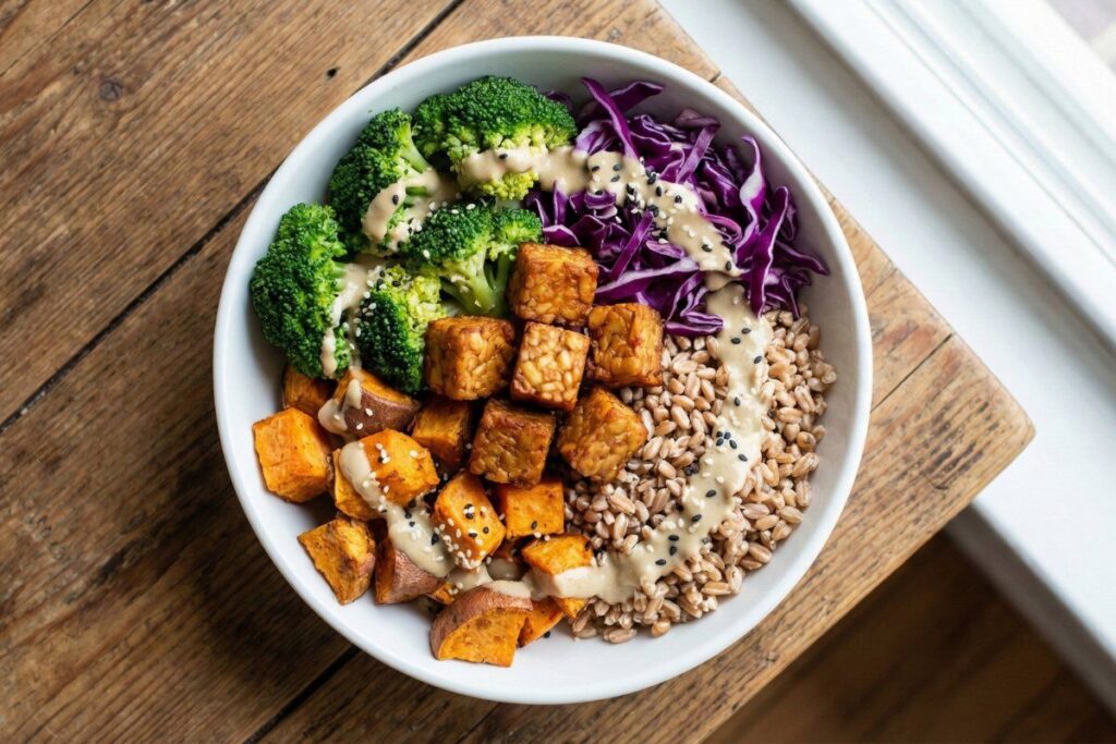 Tempeh Buddha bowl with fermented soy protein and roasted vegetables